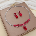 Zircon butterfly jewelry set with oval red stones and matching necklace earrings - Red Faceted Oval (1)