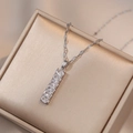 Silver tone bamboo style pendant necklace featuring six oval zircons on a wavy chain - White Zirconia Bamboo Style (X0822) / Silver