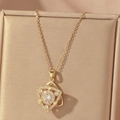 Golden titanium steel necklace featuring a geometric flower pendant with white zircons - Gold Overlapping Geometric Triangle Style (X0652)
