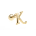 Detailed macro of 18K gold letter K stud earring with secure screw-back ball closure - Letter K / Gold
