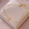 Elegante bracciale scorrevole dorato regolabile con ciondolo luna e stella in zirconi - Bracciale Stella Luna (TS0225) / Luna Stella Oro