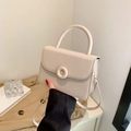 Elegante borsa a tracolla bianco crema con fibbia rotonda e sottile tracolla rimovibile - Cachi