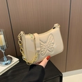 Beige faux leather baguette bag with embossed butterfly and gold chain strap detail - Khaki