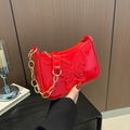 Glossy red patent leather underarm bag with embossed butterfly and gold chain strap - Red