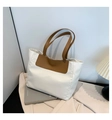 Minimalist cream nylon tote bag with brown leather handles and fashion logo detail - White