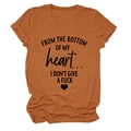 Detail of terracotta cotton T-shirt featuring vintage slogan print and rolled cuff sleeve - Burnt Orange (Black Font)