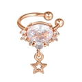 Detail of rose gold ear cuff with oval zircon center and hanging hollow star pendant - Star Pendant Style Rose Gold (EGJ0113)