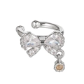 Detailed macro of silver bow ear cuff with white zircons and champagne pendant - Bowknot Style Silver (EGJ0115)