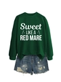 Detail of green crewneck sweatshirt with graphic print and ripped denim shorts set - Dark Green (White Font)