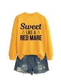 Detail of yellow sweatshirt with Sweet LIKE A RED MARE print and denim shorts - Yellow (Black Font)