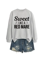Close-up of gray crewneck sweatshirt with black horse graphic and frayed denim shorts - Grey (Black Font)