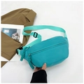 Detail view of bright green nylon waist bag with adjustable strap and buckle closure - Sky Blue