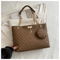 Detail of vintage monogram tote bag with gold chain strap and mini round purse attachment - Brown