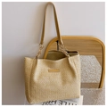 Elegante beige geweven strooien shopper met bruine leren handvatten en gouden ketting - Khaki