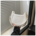 Detail of white crescent shoulder bag featuring gold Fashion & Bag logo and buckle - White