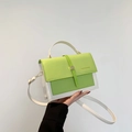 Green and white patchwork crossbody bag with metal lock and adjustable strap - Green