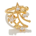 Detail of golden star-shaped ear cuff featuring clear cubic zirconia in a meteor design - Star Tassel Style-Gold (EGJ0017)