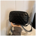 Black quilted crossbody bag with stylish black and white wide fabric shoulder strap - Black