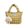 Yellow textured bubble nylon tote bag with ruffled handle and cute mushroom plush charm - Yellow