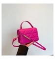 Detail of rose red quilted crossbody bag with golden metal trim and sleek PU leather texture - Rose Red