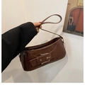 Brown crocodile embossed underarm bag with decorative belt buckle and silver hardware - Brown