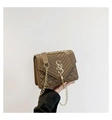 Detail of brown quilted crossbody bag with gold S-logo and chain shoulder strap - Brown