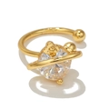 Golden planet-shaped ear cuff with sparkling zircon stone and clover element - Saturn Planet Style-Gold (EGJ0019)