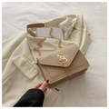 Detail of beige flap bag featuring a golden S-shaped buckle and metal tassel fringe - Khaki