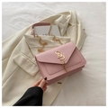 Elegant pink envelope chain bag with gold tassel and dual S logo on white fabric - Pink