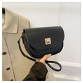Minimalist black leather saddle bag with golden geometric buckle and slim shoulder strap - Black