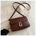 Minimalist brown crossbody square bag with silver trapezoid buckle on beige blazer - Brown