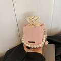 Pink bucket bag with large pearl handle and golden chain strap for women fashion - Pink