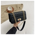 Elegant black quilted shoulder bag with gold chain strap and turn-lock closure - Black