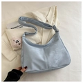 Light blue hobo tote bag in suede texture with pink plush pendant and wide shoulder strap - Blue