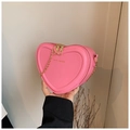 Pink heart-shaped crossbody bag with gold chain strap and rich rabbit logo print - Pink