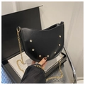 Detail of black leather hobo bag with sparkling rhinestone circle and gold chain strap - Black