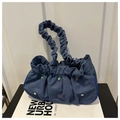 Close-up of pleated denim shoulder bag featuring colorful gemstone decorations - Dark Green
