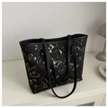 Detail of embroidered gold butterflies on a large black leather tote bag for women - Solid Black
