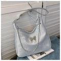 Silver-grey minimalist hobo bag with metal butterfly accent and chain strap detail - Silver