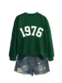 Detail of dark green sweatshirt with 1976 print and distressed denim shorts - Dark Green Sweatshirt (White Font)