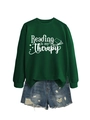 Detail view of dark green sweatshirt with Reading is my Therapy text and denim shorts - S / Dark Green (White Font)