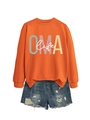 Dettaglio della felpa arancione OMA life con pantaloncini in denim strappati - S / Arancione