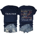 Close-up of Teacher t-shirt back print with inspirational quote and heart graphic - Navy Blue (White Graphic)