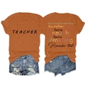 Detail view of burnt orange teacher T-shirt with back inspirational text and denim shorts - Burnt Orange (Black Graphic)