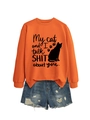 Detail view of orange sweatshirt featuring humorous cat print and denim shorts set - Orange (Black Font)