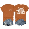 Détail d'un t-shirt orange en coton avec slogan blanc et imprimé cœur d'os - Orange Brûlé (Graphique Blanc)