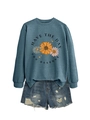 Detail of blue daisy sweatshirt and distressed denim shorts with fringe and ripped texture - Blue (Black Print)