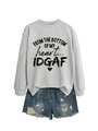 Detail of light grey crewneck sweatshirt with heart print and ripped denim shorts set - Grey (Black Print)