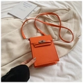 Vertical bright orange crossbody phone bag with crossgrain leather and silver buckle - Orange