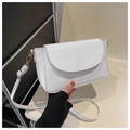 Detailed shot of white crossbody flap bag with elegant gold metal buckle and strap - White